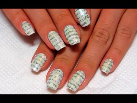 Газетный маникюр на ногтях