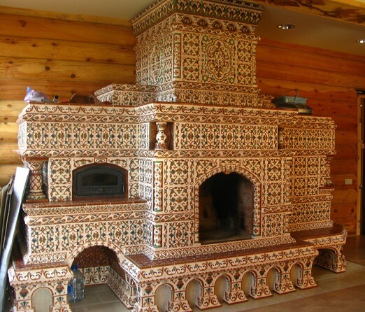 Облицовочная плитка для камина: виды, особенности укладки